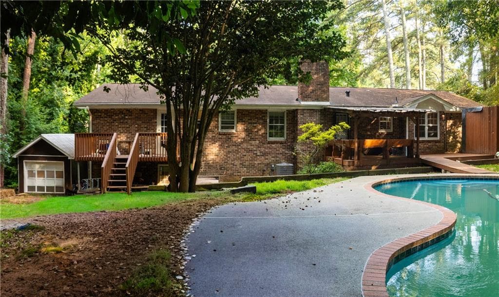 3 bedroom, 2 bathroom, 1,808 sq ft single family residence for sale at 5873 Button Gwinnett Place, Norcross, GA 30093 — photo 5