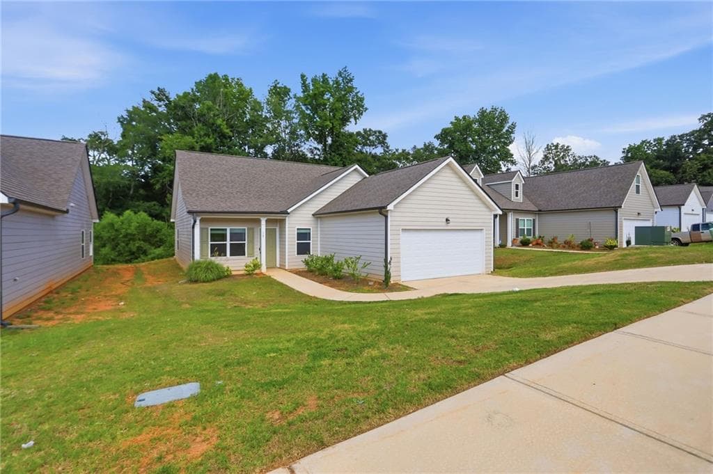 4 bedroom, 2 bathroom, 1,624 sq ft single family residence for sale at 115 Culver Street, Jackson, GA 30233 — photo 2
