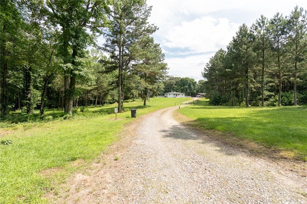 3 bedroom, 2 bathroom, 1,705 sq ft single family residence for sale at 1585 Jimmy Dodd Road, Buford, GA 30518 — photo 2