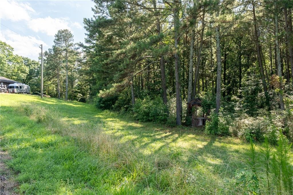 3 bedroom, 2 bathroom, 1,705 sq ft single family residence for sale at 1585 Jimmy Dodd Road, Buford, GA 30518 — photo 4