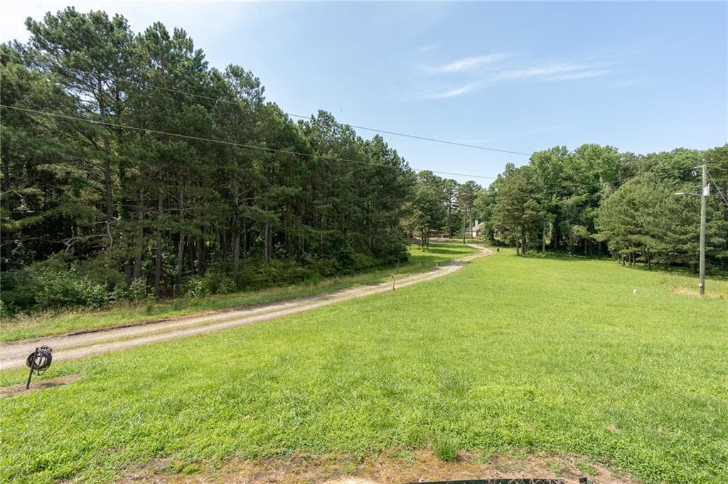 3 bedroom, 2 bathroom, 1,705 sq ft single family residence for sale at 1585 Jimmy Dodd Road, Buford, GA 30518 — photo 10