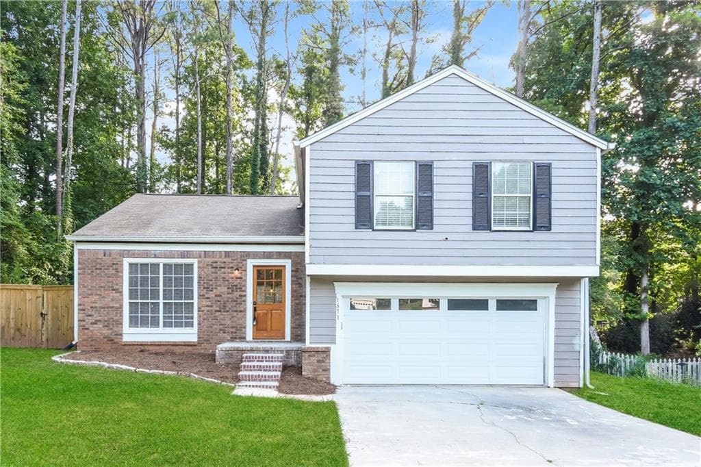 3 bedroom, 2 bathroom, 1,652 sq ft single family residence for sale at 1671 Spindle Court, Lawrenceville, GA 30044