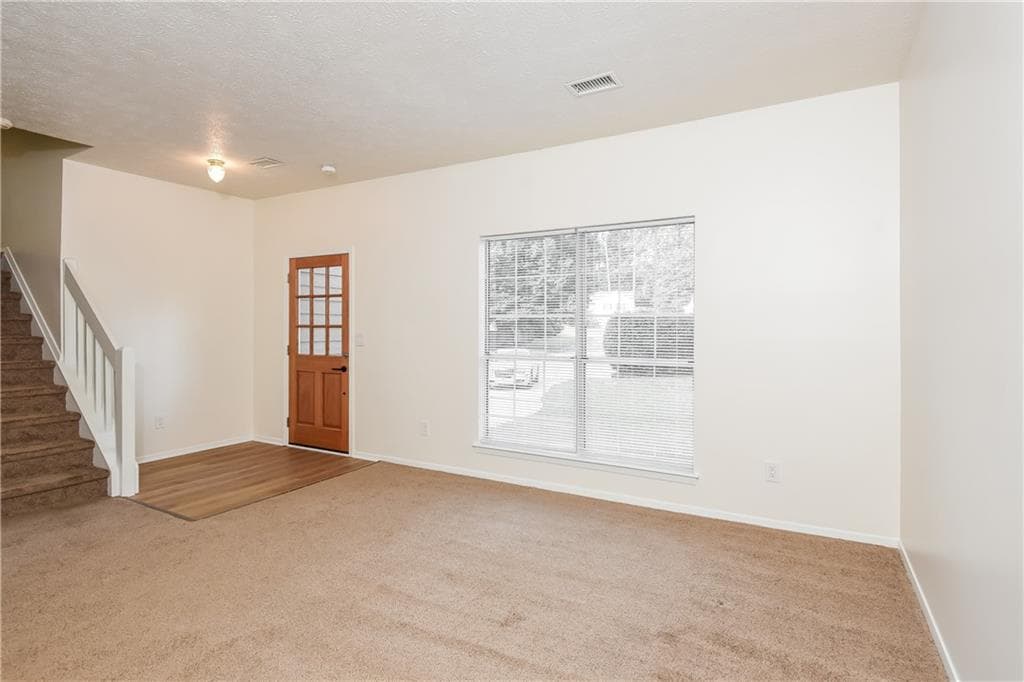 3 bedroom, 2 bathroom, 1,652 sq ft single family residence for sale at 1671 Spindle Court, Lawrenceville, GA 30044 — photo 2