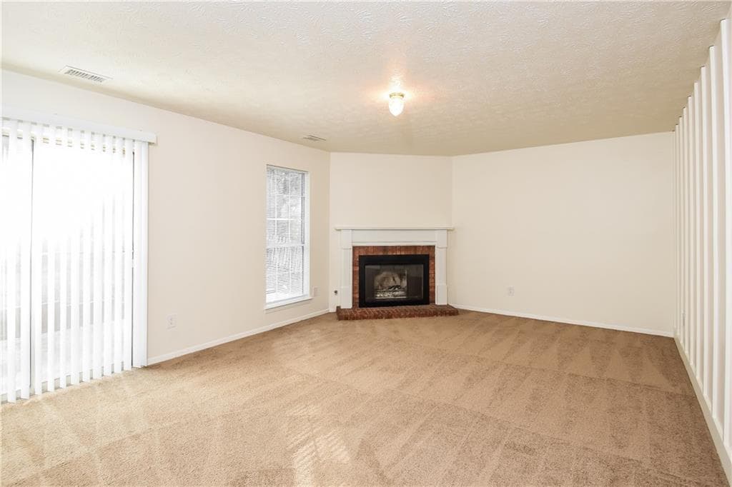 3 bedroom, 2 bathroom, 1,652 sq ft single family residence for sale at 1671 Spindle Court, Lawrenceville, GA 30044 — photo 4