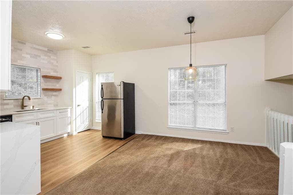 3 bedroom, 2 bathroom, 1,652 sq ft single family residence for sale at 1671 Spindle Court, Lawrenceville, GA 30044 — photo 6