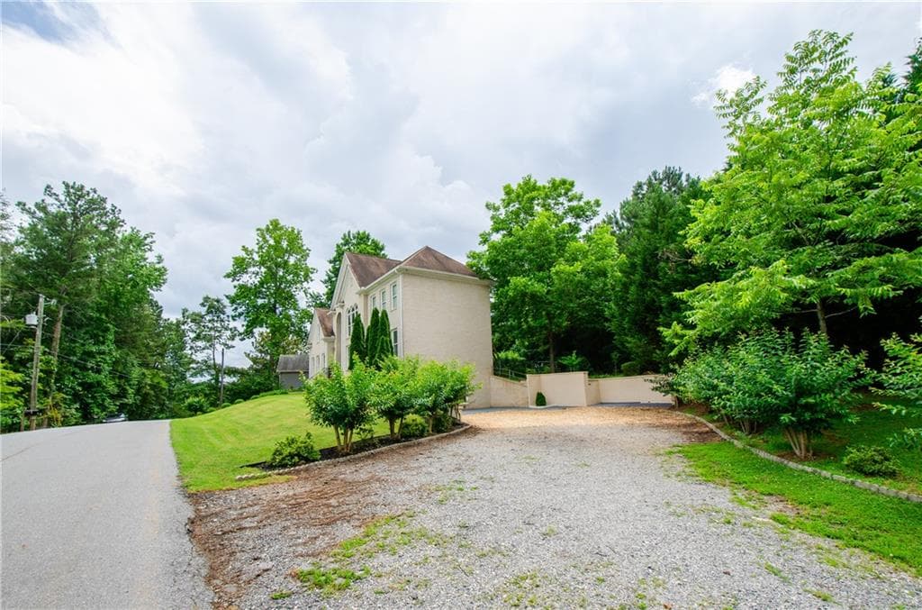 4 bedroom, 4 bathroom, 3,190 sq ft single family residence for sale at 2120 Shaffer Road, Cumming, GA 30041 — photo 4