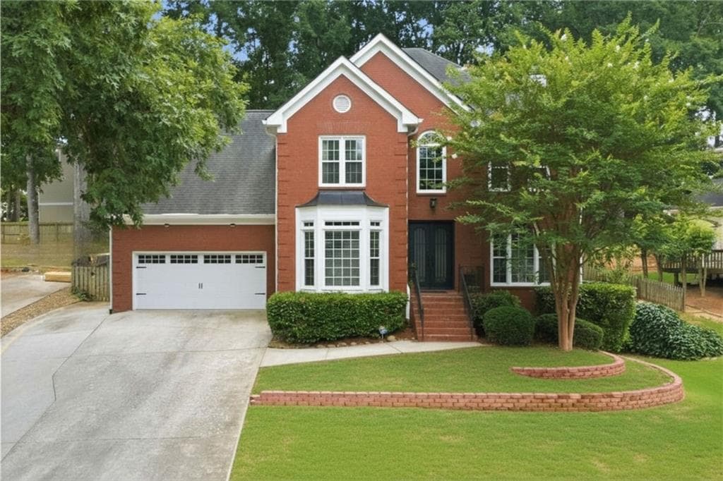 5 bedroom, 4 bathroom, 4,200 sq ft single family residence for sale at 1390 Rivershyre Parkway, Lawrenceville, GA 30043 — photo 1 of 56