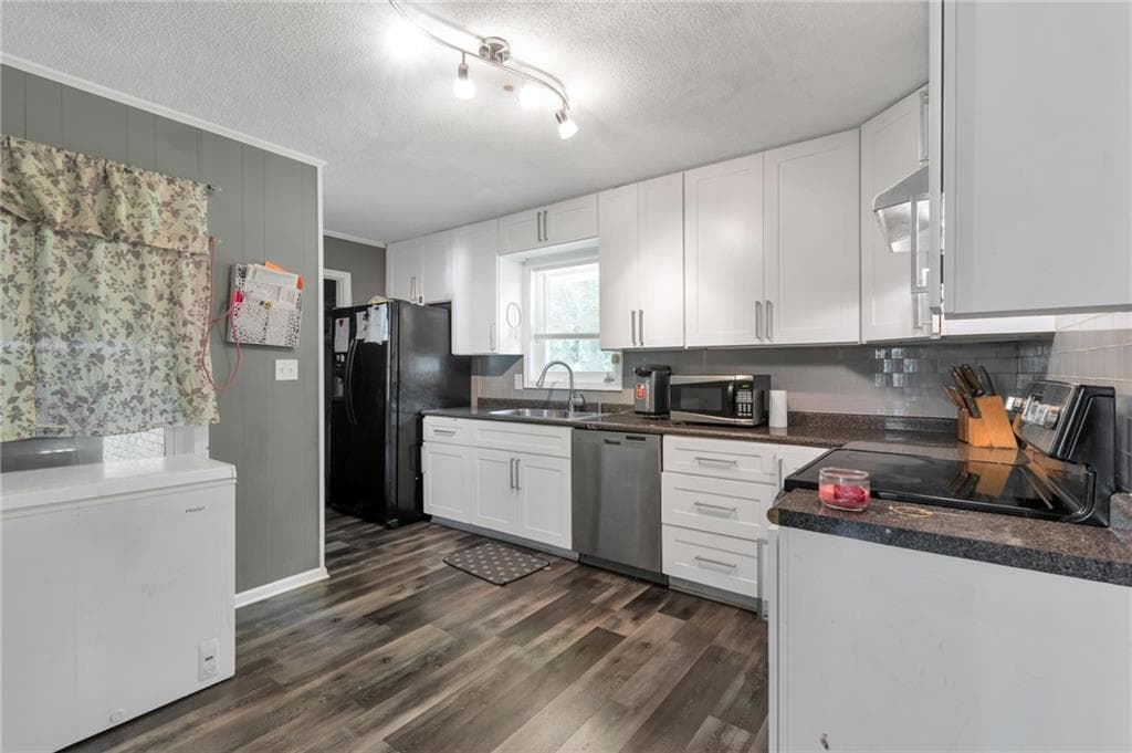 3 bedroom, 2 bathroom, 1,832 sq ft single family residence for sale at 4854 Rosewood Drive, Lilburn, GA 30047 — photo 5
