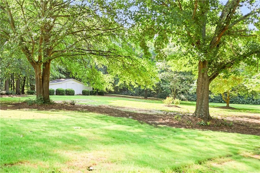 4 bedroom, 4 bathroom, 3,200 sq ft single family residence for sale at 235 Minish Lake Road, Commerce, GA 30530 — photo 9