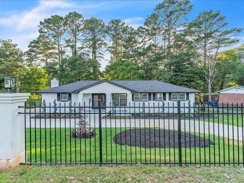 3 bedroom, 3 bathroom, 1,875 sq ft single family residence for sale at 6873 Church Street, Riverdale, GA 30274 — photo 4