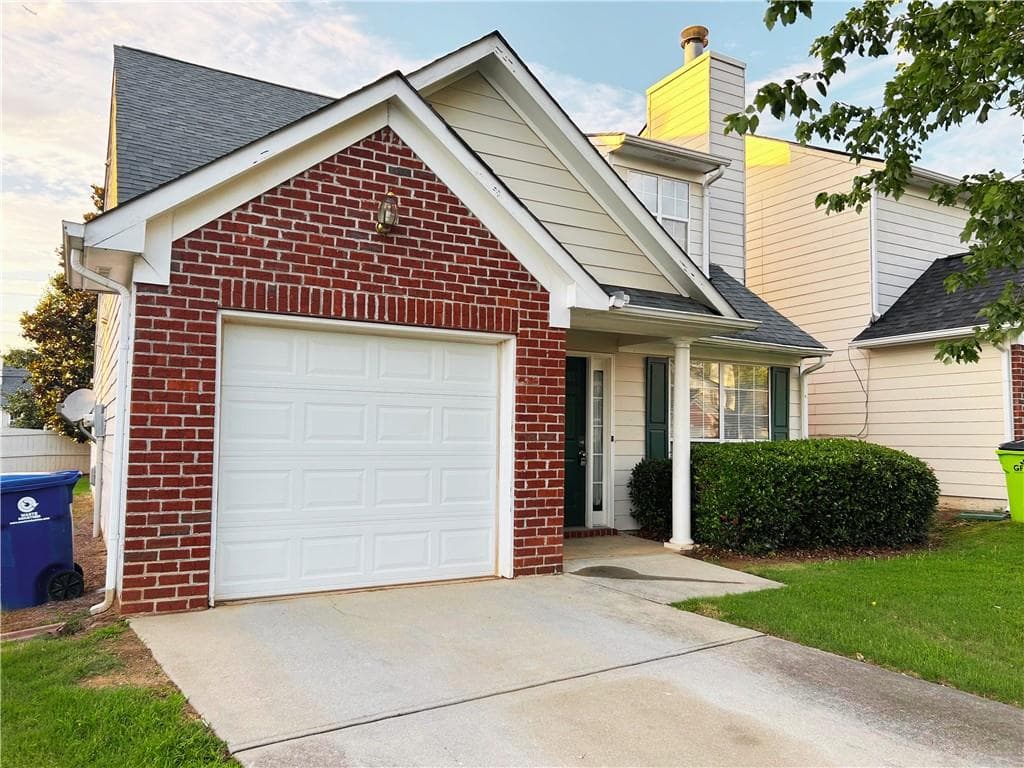 3 bedroom, 4 bathroom, 1,394 sq ft single family residence for sale at 4123 Ravenwood Court, Union City, GA 30291 — photo 2