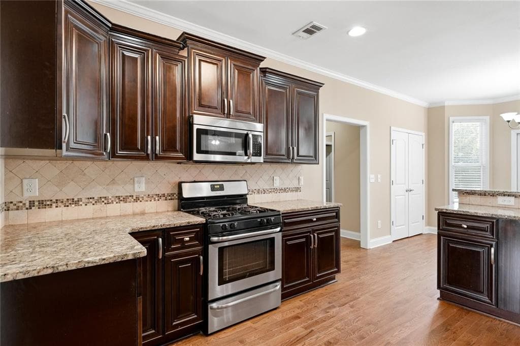 5 bedroom, 3 bathroom, 3,152 sq ft single family residence for sale at 3475 Golfe Links Drive, Snellville, GA 30039 — photo 8