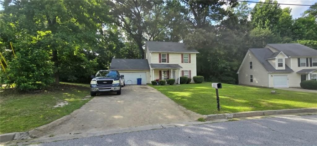4 bedroom, 3 bathroom, 1,500 sq ft single family residence for sale at 865 Old Rocky Road, Atlanta, GA 30349