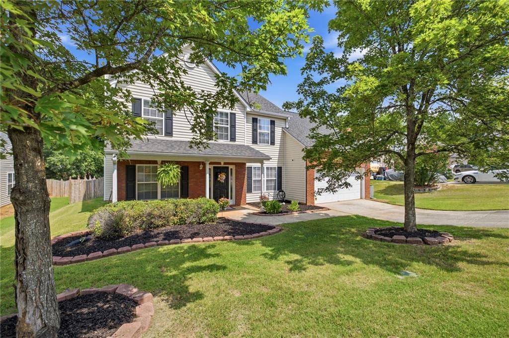 4 bedroom, 3 bathroom, 2,123 sq ft single family residence for sale at 3456 Garden Manor Drive, Loganville, GA 30052 — photo 2