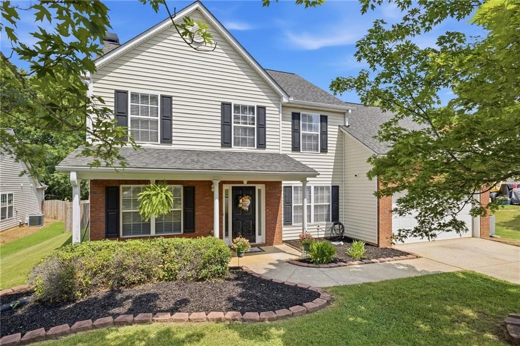 4 bedroom, 3 bathroom, 2,123 sq ft single family residence for sale at 3456 Garden Manor Drive, Loganville, GA 30052 — photo 1 of 54