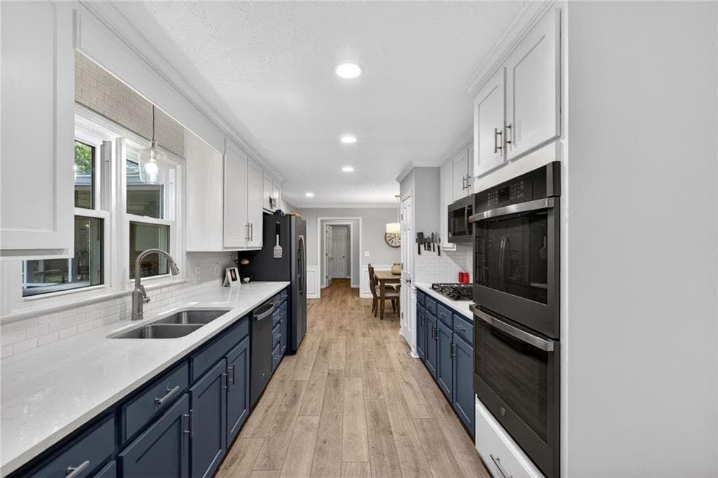 4 bedroom, 3 bathroom, 3,354 sq ft single family residence for sale at 1235 Buice Drive, Lilburn, GA 30047 — photo 5