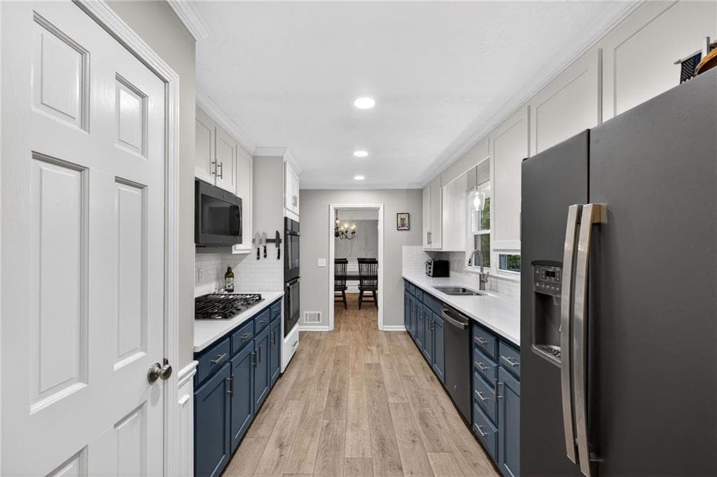 4 bedroom, 3 bathroom, 3,354 sq ft single family residence for sale at 1235 Buice Drive, Lilburn, GA 30047 — photo 7