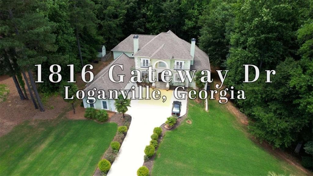4 bedroom, 5 bathroom, 5,431 sq ft single family residence for sale at 1816 Gateway Drive, Loganville, GA 30052 — photo 1 of 99