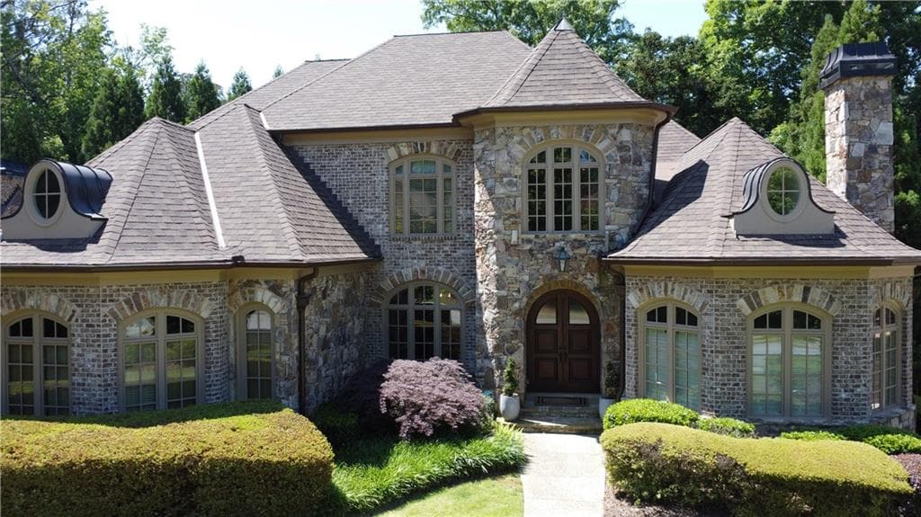 6 bedroom, 8 bathroom, 7,990 sq ft single family residence for sale at 841 Camden Park Court, Atlanta, GA 30342 — photo 2