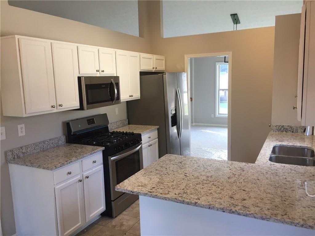 4 bedroom, 3 bathroom, 2,199 sq ft single family residence for rent at 2575 Hamilton Chase Run, Buford, GA 30519 for $2,250 a month — photo 4