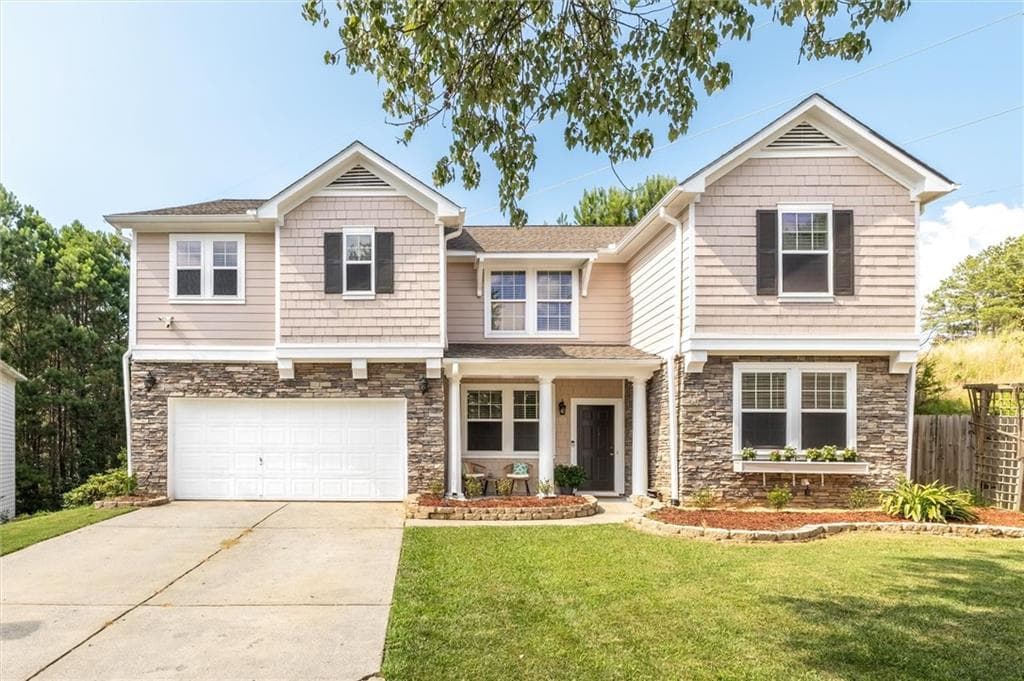 4 bedroom, 3 bathroom, 3,457 sq ft single family residence for sale at 6261 Sparkling Cove Lane, Buford, GA 30518 — photo 3