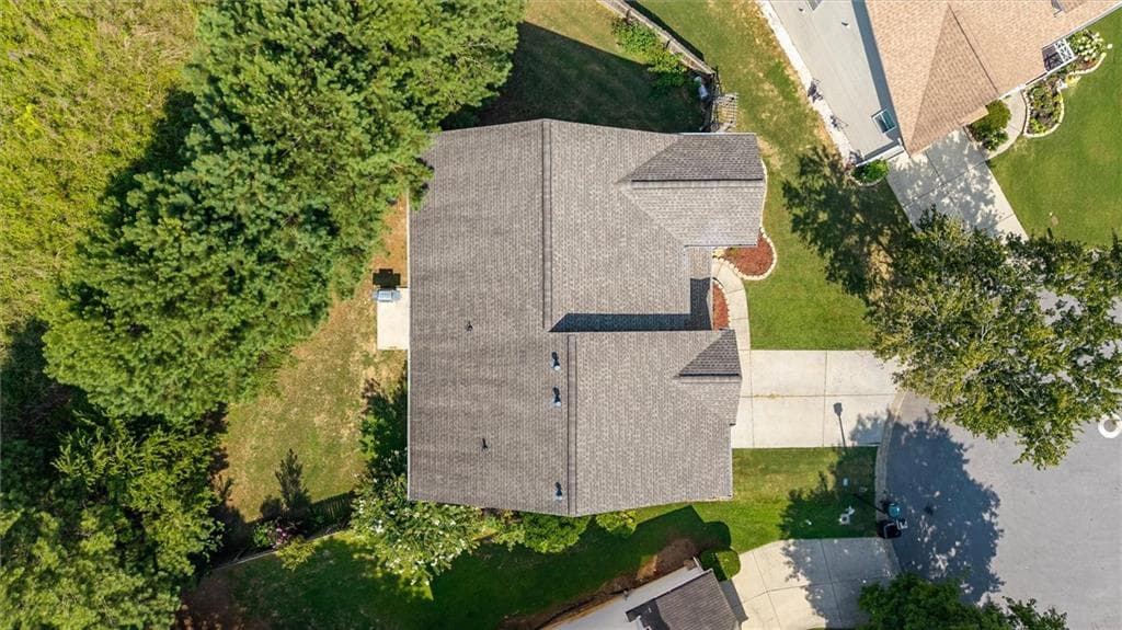 4 bedroom, 3 bathroom, 3,457 sq ft single family residence for sale at 6261 Sparkling Cove Lane, Buford, GA 30518 — photo 6