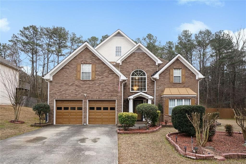 5 bedroom, 3 bathroom, 3,057 sq ft single family residence for sale at 3382 Sandwedge Court, Snellville, GA 30039