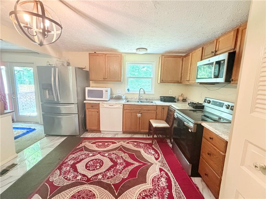 5 bedroom, 3 bathroom, 1,983 sq ft single family residence for sale at 5308 Olde Street, Stone Mountain, GA 30088 — photo 5