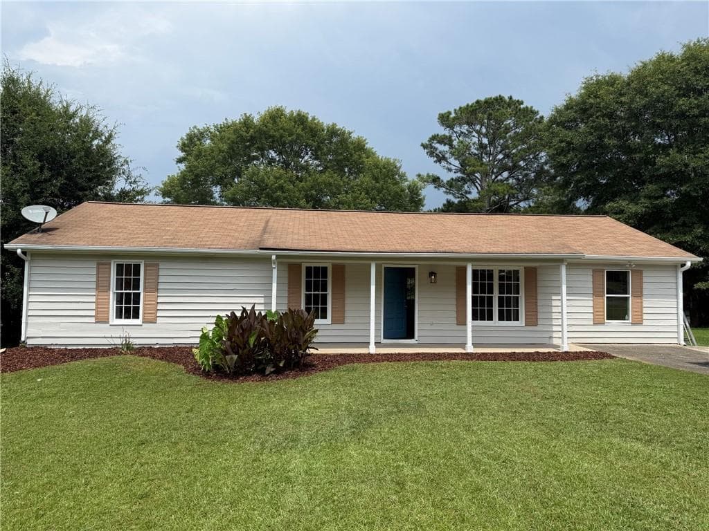 4 bedroom, 2 bathroom, 1,456 sq ft single family residence for sale at 3165 Delhi Drive, Powder Springs, GA 30127 — photo 2