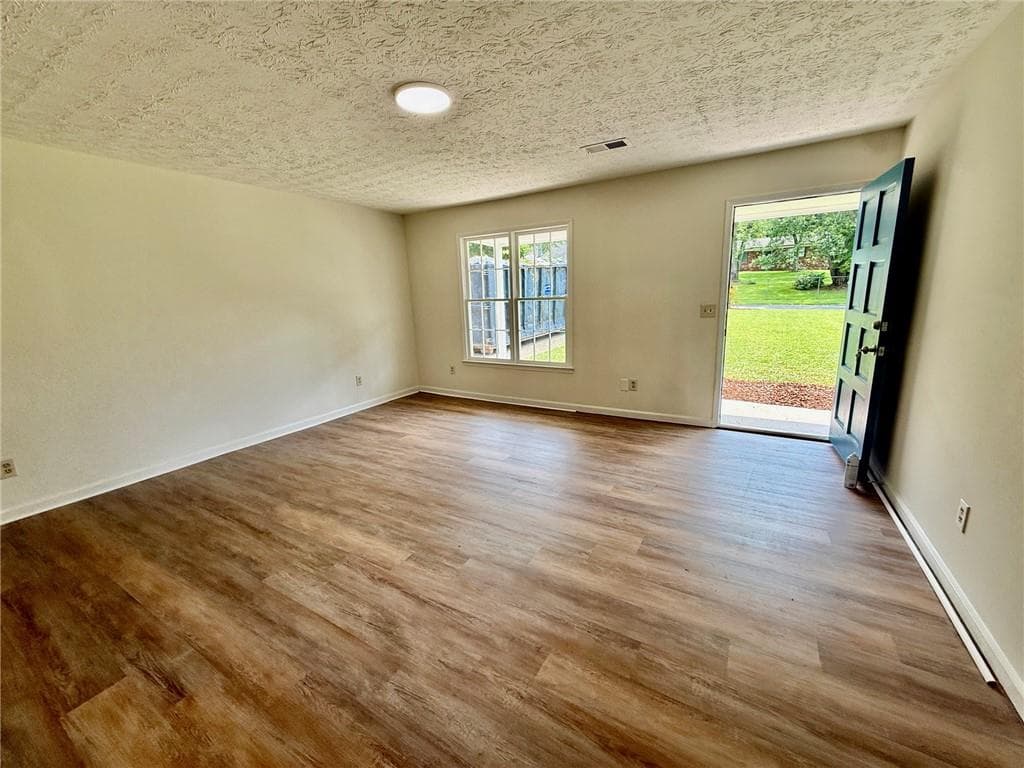 4 bedroom, 2 bathroom, 1,456 sq ft single family residence for sale at 3165 Delhi Drive, Powder Springs, GA 30127 — photo 3