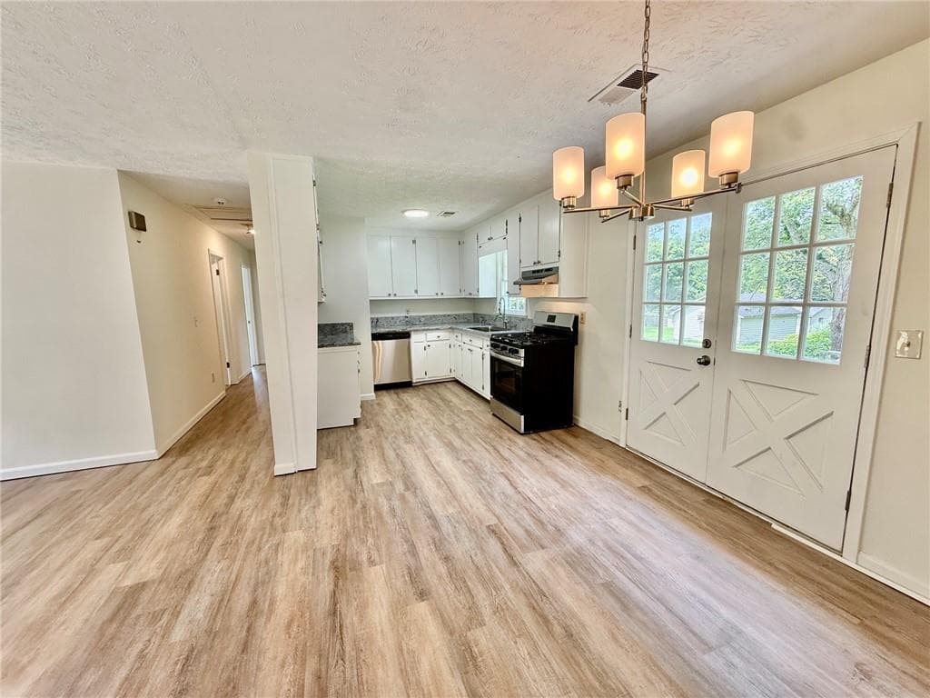 4 bedroom, 2 bathroom, 1,456 sq ft single family residence for sale at 3165 Delhi Drive, Powder Springs, GA 30127 — photo 5
