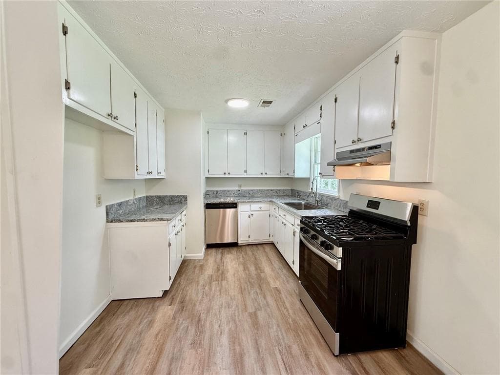 4 bedroom, 2 bathroom, 1,456 sq ft single family residence for sale at 3165 Delhi Drive, Powder Springs, GA 30127 — photo 7