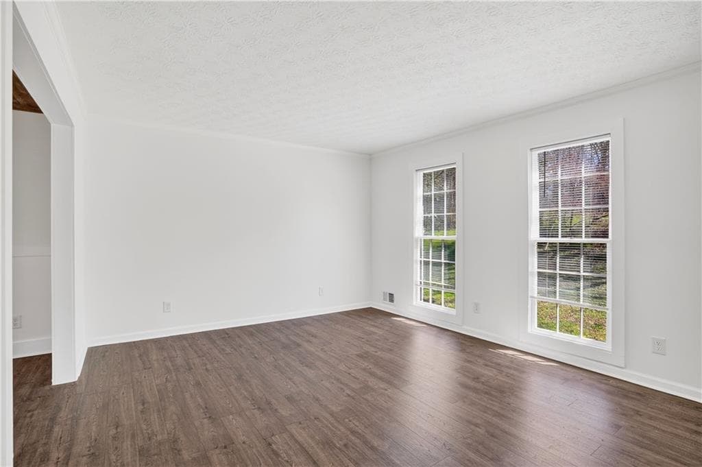 4 bedroom, 3 bathroom, 2,322 sq ft single family residence for sale at 9200 Brave Court, Jonesboro, GA 30236 — photo 8