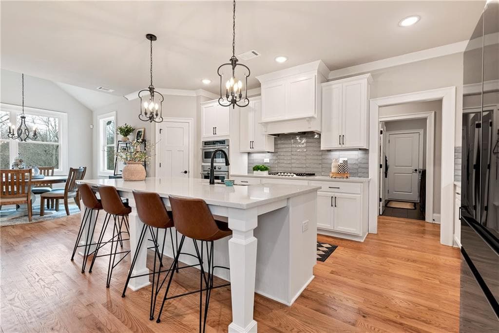 6 bedroom, 5 bathroom, 4,708 sq ft single family residence for sale at 6140 Crescent Moon Ridge, Cumming, GA 30041 — photo 8