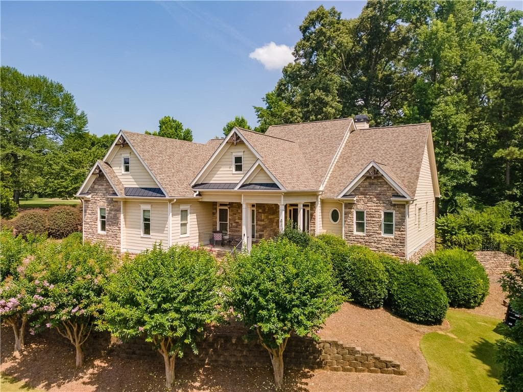 4 bedroom, 4 bathroom, 3,917 sq ft single family residence for sale at 6080 Heritage Manor Drive, Cumming, GA 30040 — photo 2