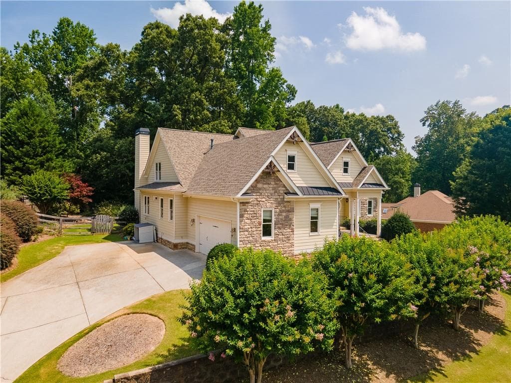 4 bedroom, 4 bathroom, 3,917 sq ft single family residence for sale at 6080 Heritage Manor Drive, Cumming, GA 30040 — photo 3