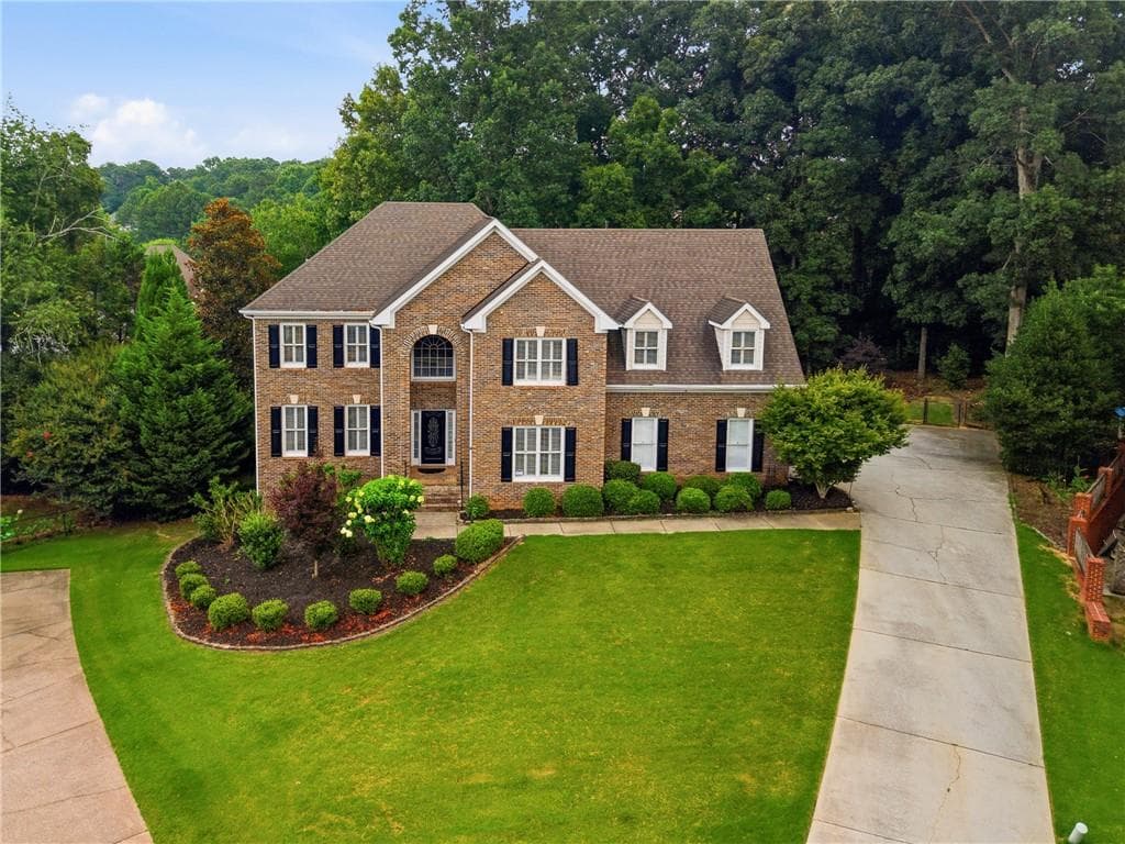 4 bedroom, 4 bathroom, 4,481 sq ft single family residence for sale at 1404 Megan Danielle Drive, Lilburn, GA 30047 — photo 2