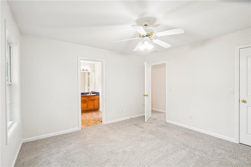 4 bedroom, 3 bathroom, 1,556 sq ft single family residence for sale at 6550 Snowbird Lane, Douglasville, GA 30134 — photo 4