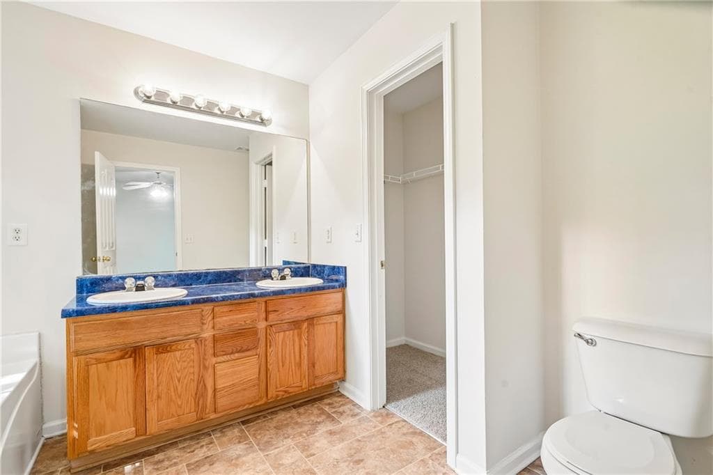 4 bedroom, 3 bathroom, 1,556 sq ft single family residence for sale at 6550 Snowbird Lane, Douglasville, GA 30134 — photo 9