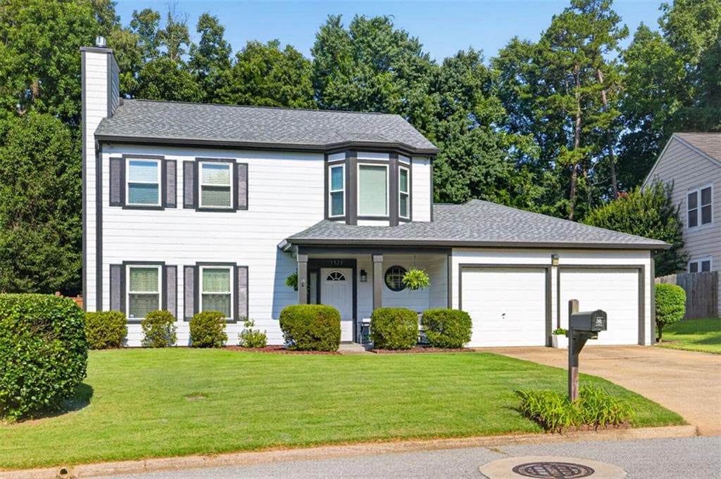 3 bedroom, 3 bathroom, 1,714 sq ft single family residence for sale at 1325 Township Drive, Lawrenceville, GA 30043 — photo 2