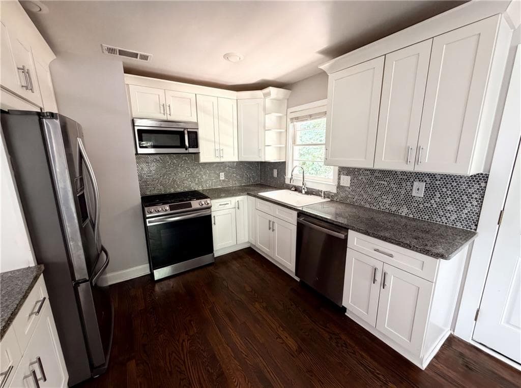 3 bedroom, 2 bathroom, 1,963 sq ft single family residence for sale at 2336 Nesbitt Drive, Atlanta, GA 30319 — photo 2