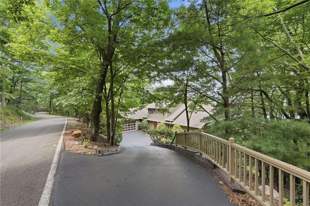 5 bedroom, 5 bathroom, 5,131 sq ft single family residence for sale at 72 Wild Cherry Lane, Big Canoe, GA 30143 — photo 2