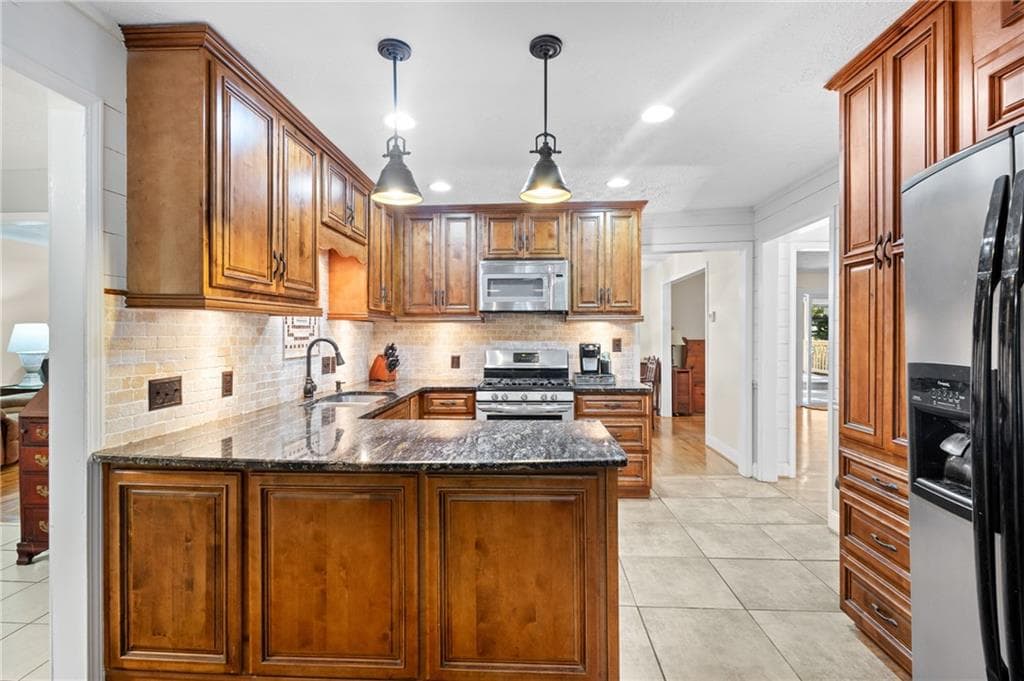5 bedroom, 4 bathroom, 3,328 sq ft single family residence for sale at 1676 Heritage Drive, Snellville, GA 30078 — photo 4