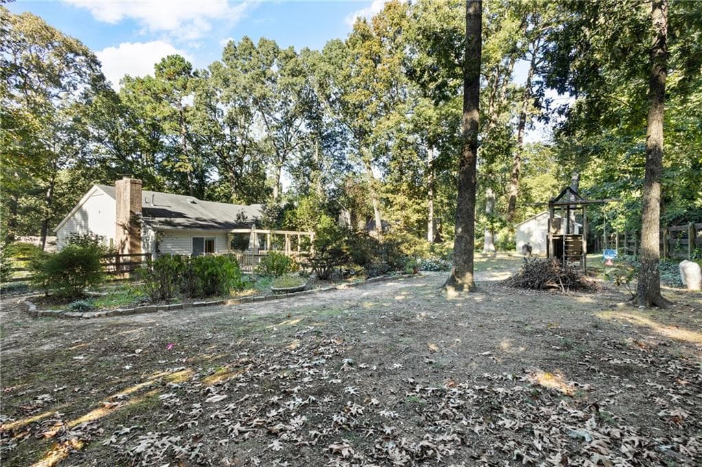 5 bedroom, 4 bathroom, 3,328 sq ft single family residence for sale at 1676 Heritage Drive, Snellville, GA 30078 — photo 5