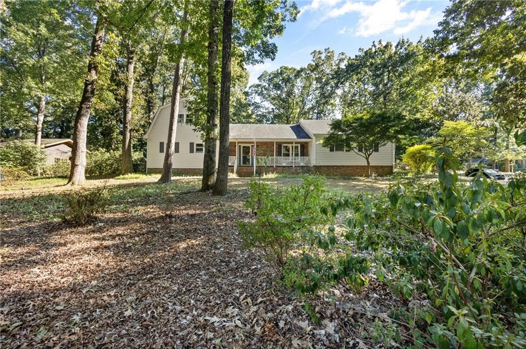 5 bedroom, 4 bathroom, 3,328 sq ft single family residence for sale at 1676 Heritage Drive, Snellville, GA 30078 — photo 6