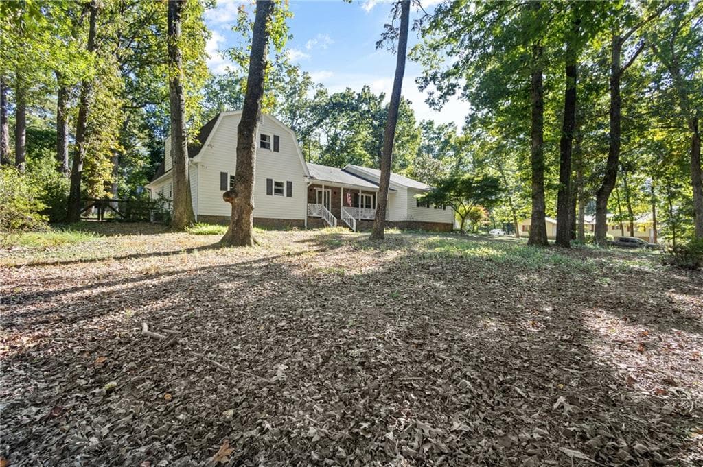 5 bedroom, 4 bathroom, 3,328 sq ft single family residence for sale at 1676 Heritage Drive, Snellville, GA 30078 — photo 7