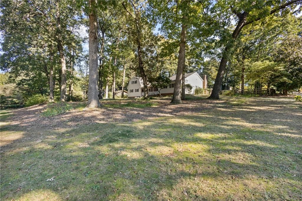 5 bedroom, 4 bathroom, 3,328 sq ft single family residence for sale at 1676 Heritage Drive, Snellville, GA 30078 — photo 9