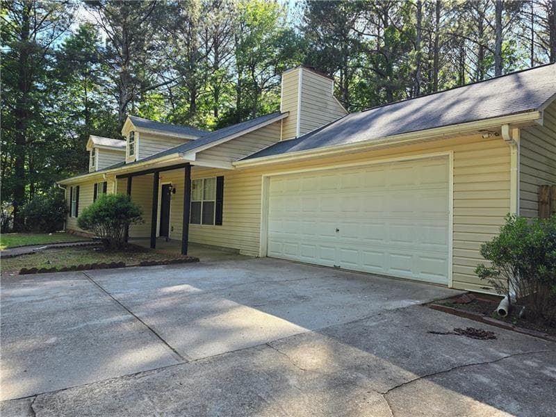 3 bedroom, 2 bathroom, 1,210 sq ft single family residence for sale at 115 BOND Drive, Ellenwood, GA 30294 — photo 2