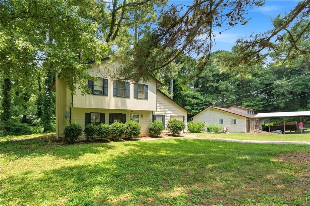 3 bedroom, 2 bathroom, 1,196 sq ft single family residence for sale at 3957 Brookstone Court, Ellenwood, GA 30294 — photo 2