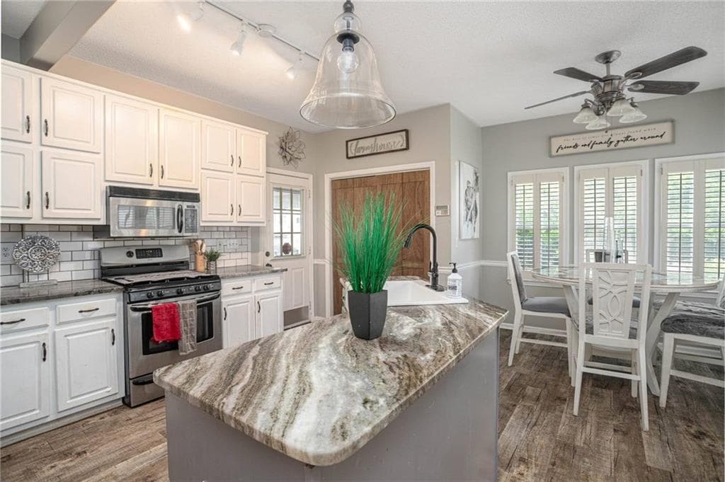 4 bedroom, 3 bathroom, 2,176 sq ft single family residence for sale at 2075 Whispering Pines Lane, Mcdonough, GA 30253 — photo 4